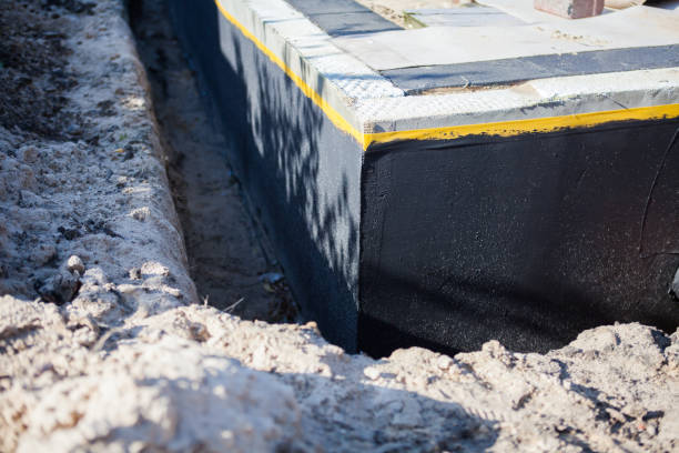 Professional Emergency Waterproofing technician working in Bremen, IN